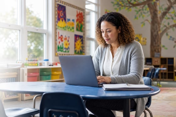 Childcare director pulling accounting billing reports using her childcare software