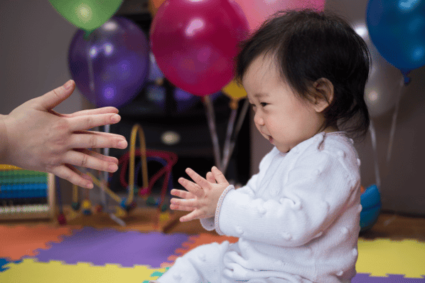 Baby clapping hands