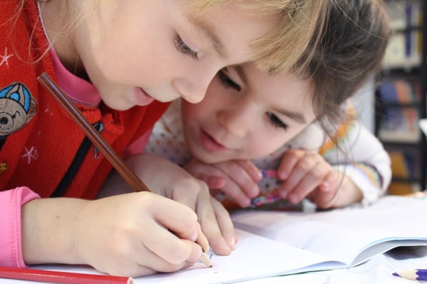 children drawing together