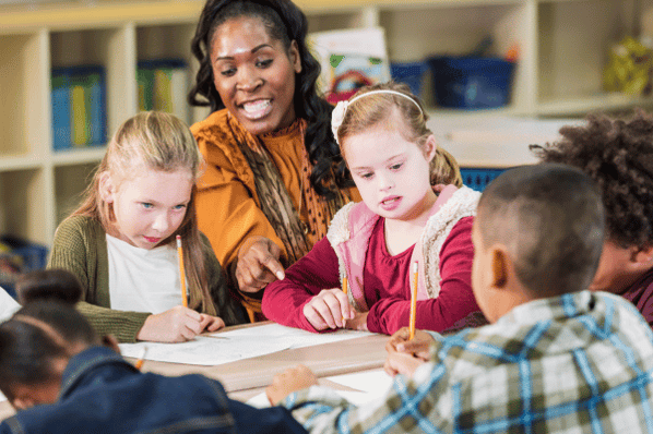 Teacher in classroom with students